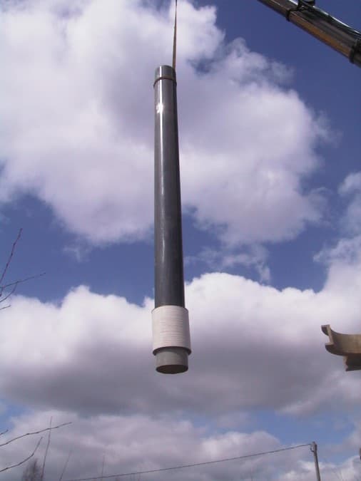 Installing a short screen tube well.